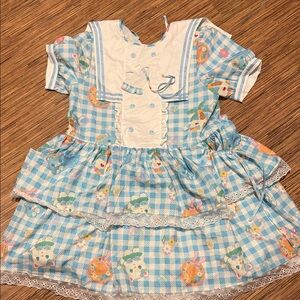 Blue Checkered Baby Dress with Animal Print